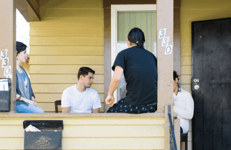 students outside house 1024x666